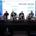 pendirian PT online: "Diskusi panel mengenai regulasi OSS dalam pendirian PT online pada konferensi infrastruktur."